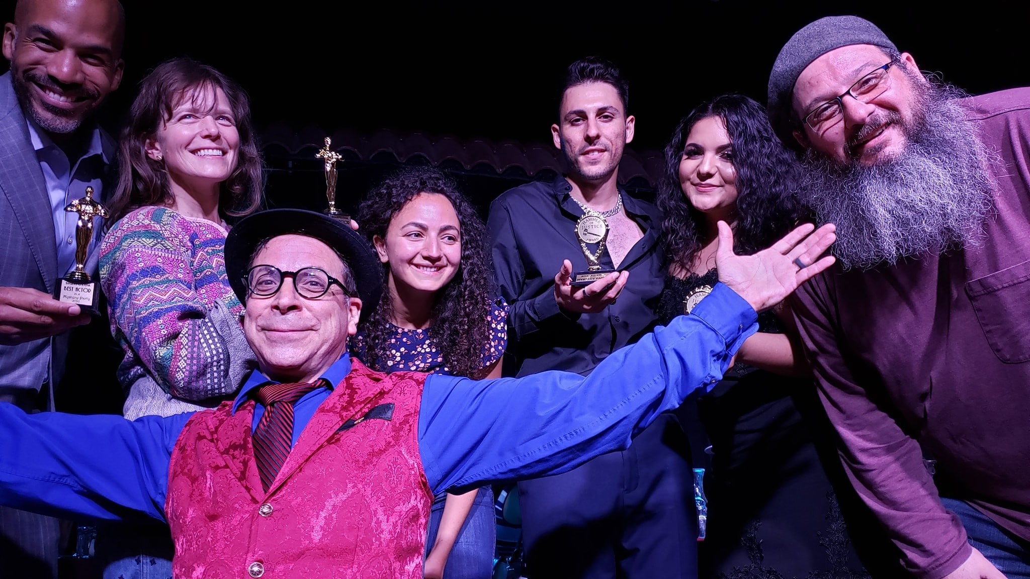 Sharpo and cast with audience members on stage at the El Cid, LA for Mystery and Magic Show.